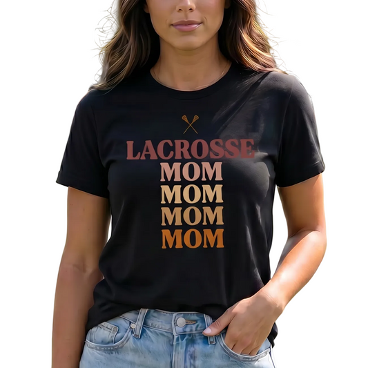 mom standing on a lacrosse field wearing jeans and a black lacrosse mom tshirt that says lacrosse mom mom mom