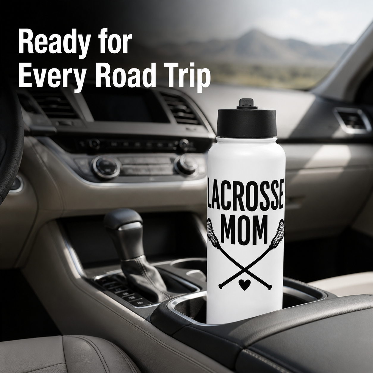 lacrosse mom written in black on a white water bottle in a car cupholder 